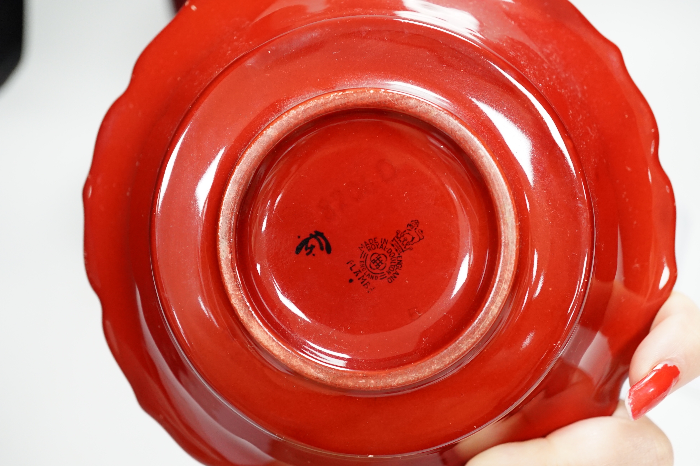 A Royal Doulton Flambé vase and bowl, the largest 22cm high